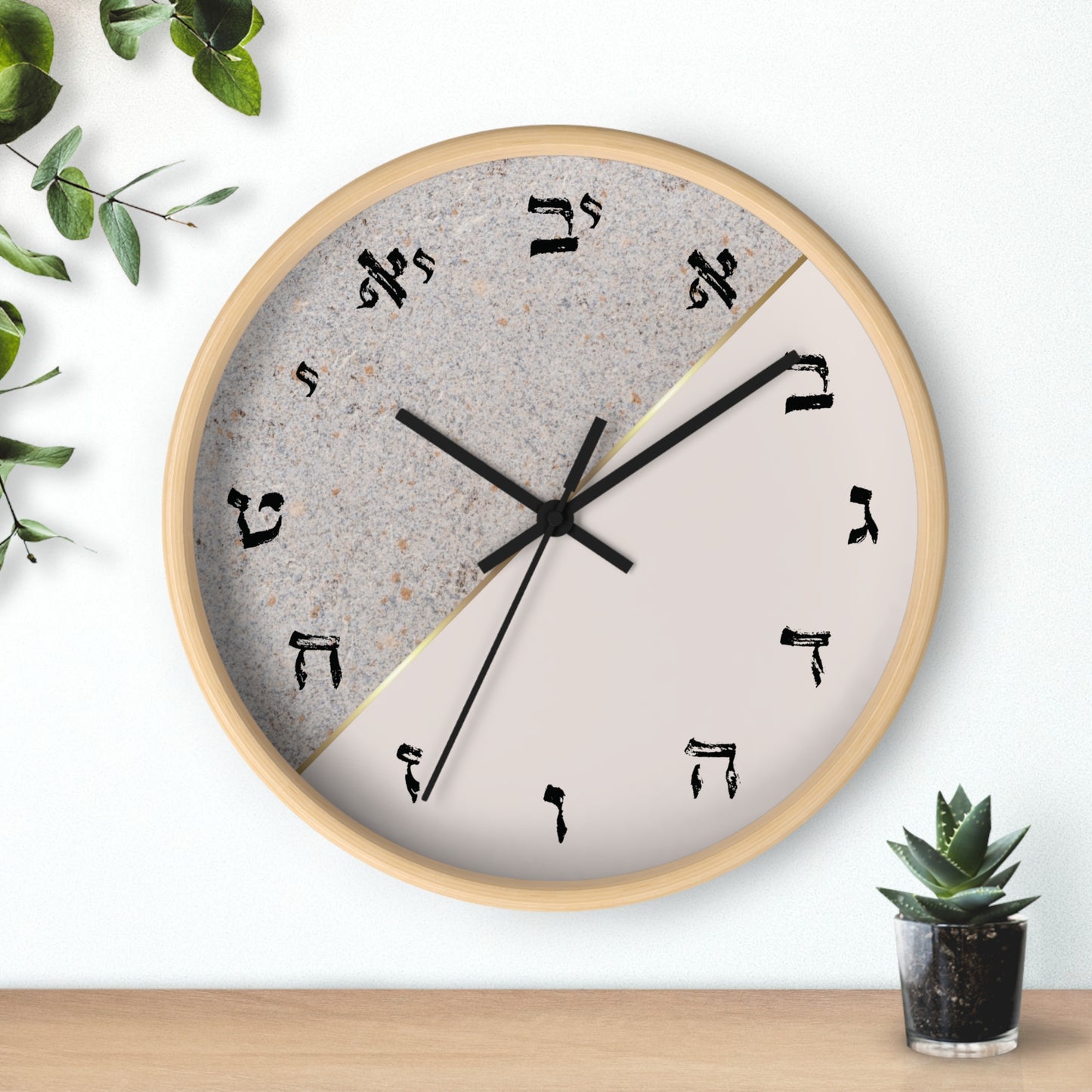 Hebrew letters wall clock with a print in shades of gray and concrete