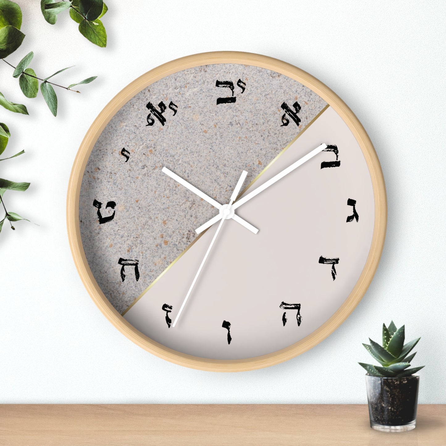 Hebrew letters wall clock with a print in shades of gray and concrete