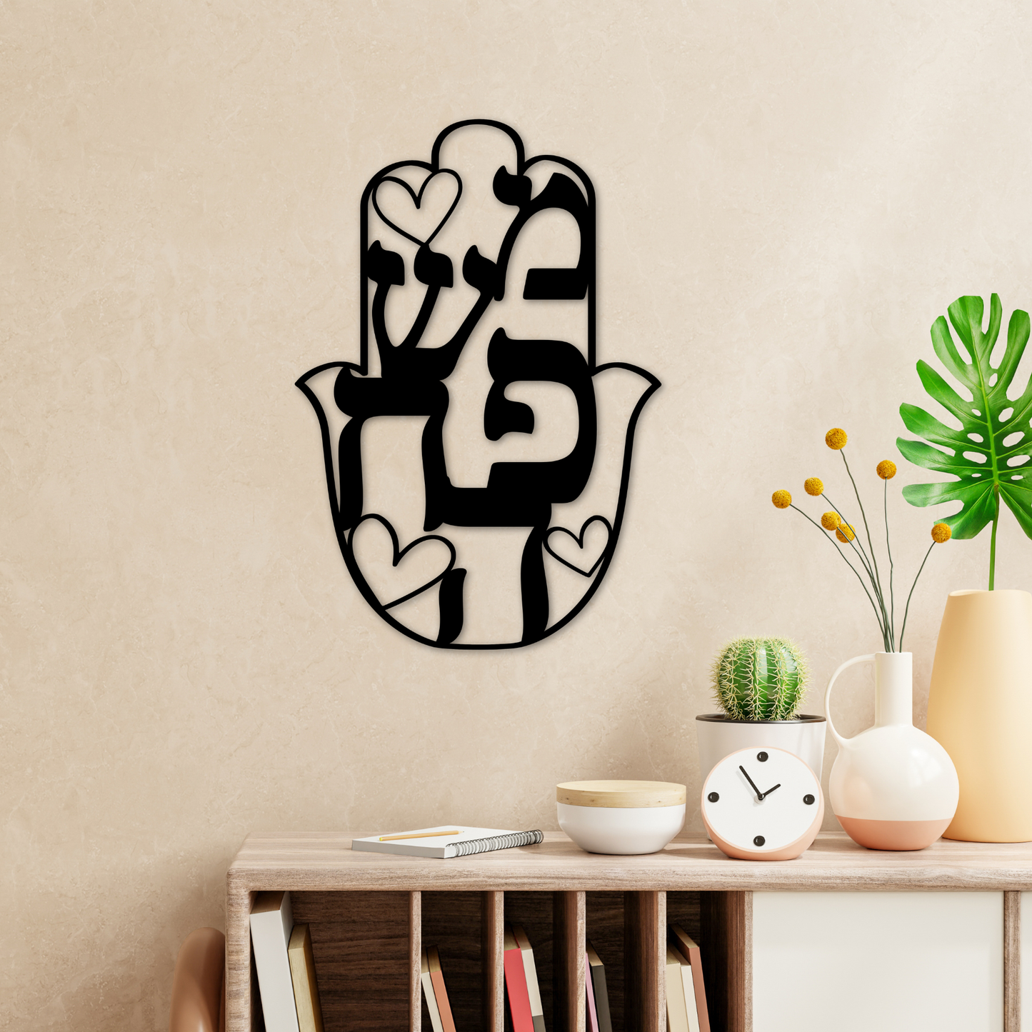 Hamsa metal sign with the Hebrew word "family"
